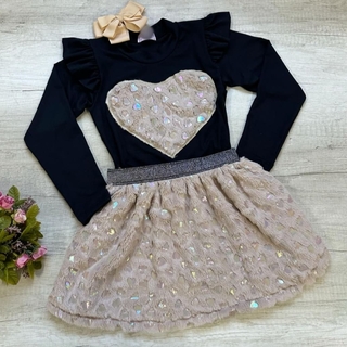 Conjunto Pelinho ( blusa visco Lycra ,saia com shorts por baixo)