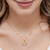 Colar com pingente de flor com estrela no centro cor cristal Banhado em Ouro 18k - comprar online