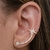 Brinco estrela de 8 pontas Ear Cuff cravejado com micro zircônias cor cristal com Banhado em Ouro 18k