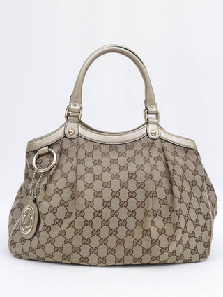 Bolsa Gucci Sukey Dourada