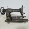 Antiga máquina de costura da Singer