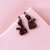 aretes gato glitter black