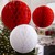 Bolas de panal de abeja en papel seda rojo 30, 25 y 15 cms de diámetro. en internet