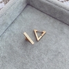 Aros Clack Triangle Gold - Acero dorado X9.A