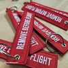 llavero Remove Before Flight rojo