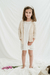 Nena con cardigan Hipocampo beige, sobre vestido Mantis off white