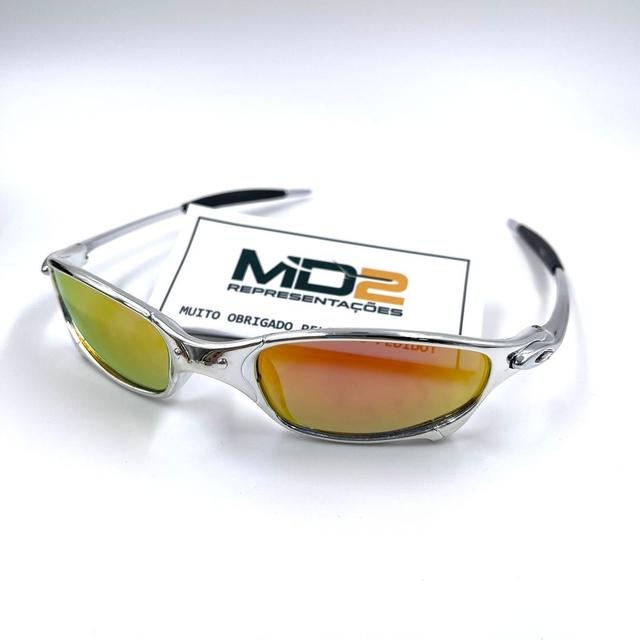 Corta vento hotsell oakley dourada
