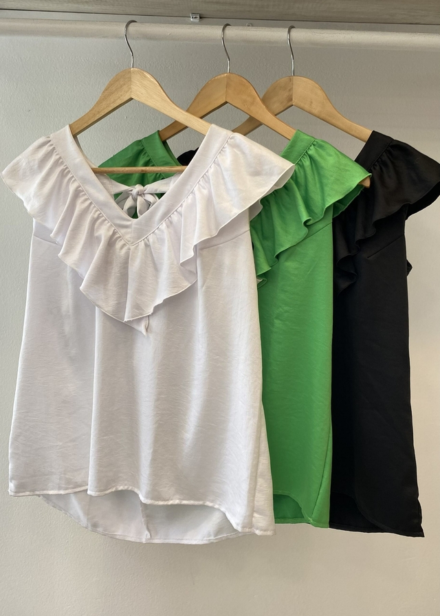 Blusa con volados en el cuello hotsell