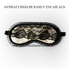 Antifaz ciego de raso con encaje negro, ideal para descansar y dormir.