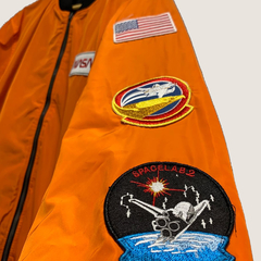 Campera Rompeviento NASA Reversible Naranja en internet