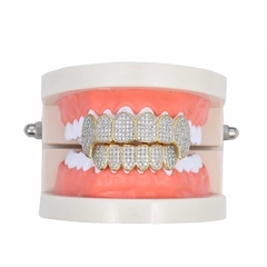 Parrilla Para Dientes Grillz Colmillos Baño de Oro 14k y Zirconias en internet