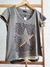 REMERA ESTRELLA ANIMAL PRINT (RI24M156)