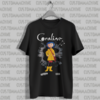 CAMISETA CORALINE BOTÃO