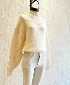 Sweater con manga trenzada en internet