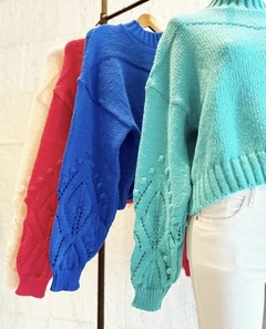 Sweater con manga trenzada