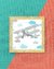 Quadro Infantil Avião Azul e Cinza Nuvens