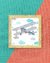 Quadro Infantil Avião Azul e Cinza Nuvens - comprar online