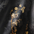 Detalhe do Papel de Parede Galhos Preto e Cinza Brilho Dourado Metálico Vinílico Lavável - Coleção Enchantment - 10 metros | 120305 - Ciça Braga
