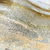 Detalhe do Papel de Parede Mármore Bege Acinzentado com Brilho Dourado - Coleção White Swan Kantai 100802 | 10 metros | Cola Grátis - Ciça Braga
