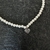 The silver heart pearl choker en internet