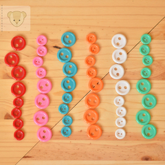 Caixinha Colorê com 48 botões - 6 cores | 17 e 25mm na internet