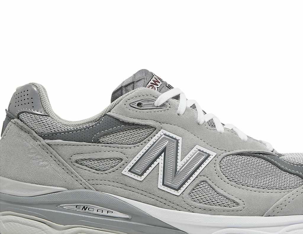 Tenis new store balance 990 cinza