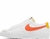 Tênis Nike Wmns Blazer Low '77 'White Orange' DC4769-105 na internet