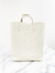 Bolsa Carolina Herrera Reversible Vertical Tote Off White + Clutch na internet