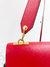 Bolsa Valentino V-Ring Preta e Vermelha na internet