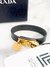 Bracelete Prada Turn Lock Logo Saffiano Preta Tam.P - Brechó Closet de Luxo