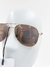 Óculos Saint Laurent Aviador Dourado e Marrom na internet