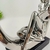 Enfeite Estatua Mulher Sentada Livro Prata Decoracao 25x23cm na internet