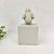 Escultura Menino No Cubo Branco 15x8x10cm Poliresina - Inigual Decor