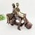 Escultura Casal Na Lambreta Marrom 28x30x11cm Moto - comprar online