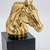 Imagem do Escultura Cavalo Dourado E Preto 16x13x8cm Enfeite Resina