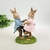 Casal De Coelhos De Resina Dançando 13x9x5cm Páscoa - comprar online