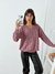 Sweater oversize escote en V y trenzas Silvie - tienda online