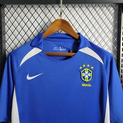 brasil-nike-retro-2002-away-reserva-2-fora-azul-branco-copa-do-mundo-patrocinios-patrocinadores-patches-patch-torcedor-torcedores-futebol-masculino-masculina-frete-gratis-envio-campeonato-internacional-selecao-selecoes-tecnologia-elastano-poliester-