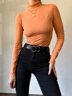 The Orange Turtleneck