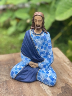 Escultura Jesus Meditando na internet