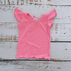 ART. 9415 - REMERA CAROLINE FUXIA