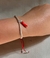 pulsera roja de plata con cuernito en internet