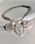 pulsera protectora tres dijes