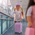 Muñeca Ari con maleta carry-on y accesorios en internet