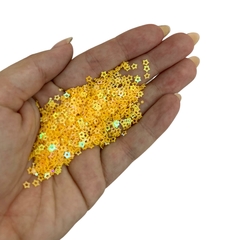 APLIQUE CONFETE GLITTER MINI ESTRELA VAZADA AMARELO SOL - 10 GRAMAS - comprar online