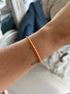 Pulsera plata y cristales naranja