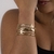 Bracelete II cravejado banhado à ouro 18k da marca Dezoitok Para Elas.