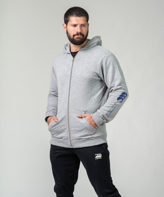 CAMPERA FRISA ESTAMPADA GRIS CANTERBURY