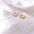 Argola Pequena Cravejada com Zircônias Banhado em Ouro 18K - SEMIJOIA - comprar online