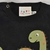 Remera Black Dino en internet